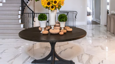 Sunflowers and pumpkin on a foyer table