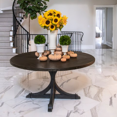 Sunflowers and pumpkin on a foyer table