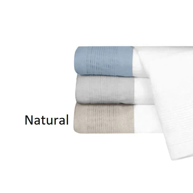 Stack of folded towels in natural color on a white background