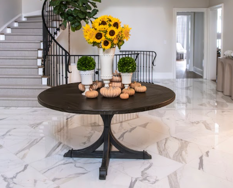 Sunflowers and pumpkin on a foyer table